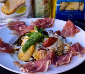 Cerchio tomate mozzarella sur légumes confits